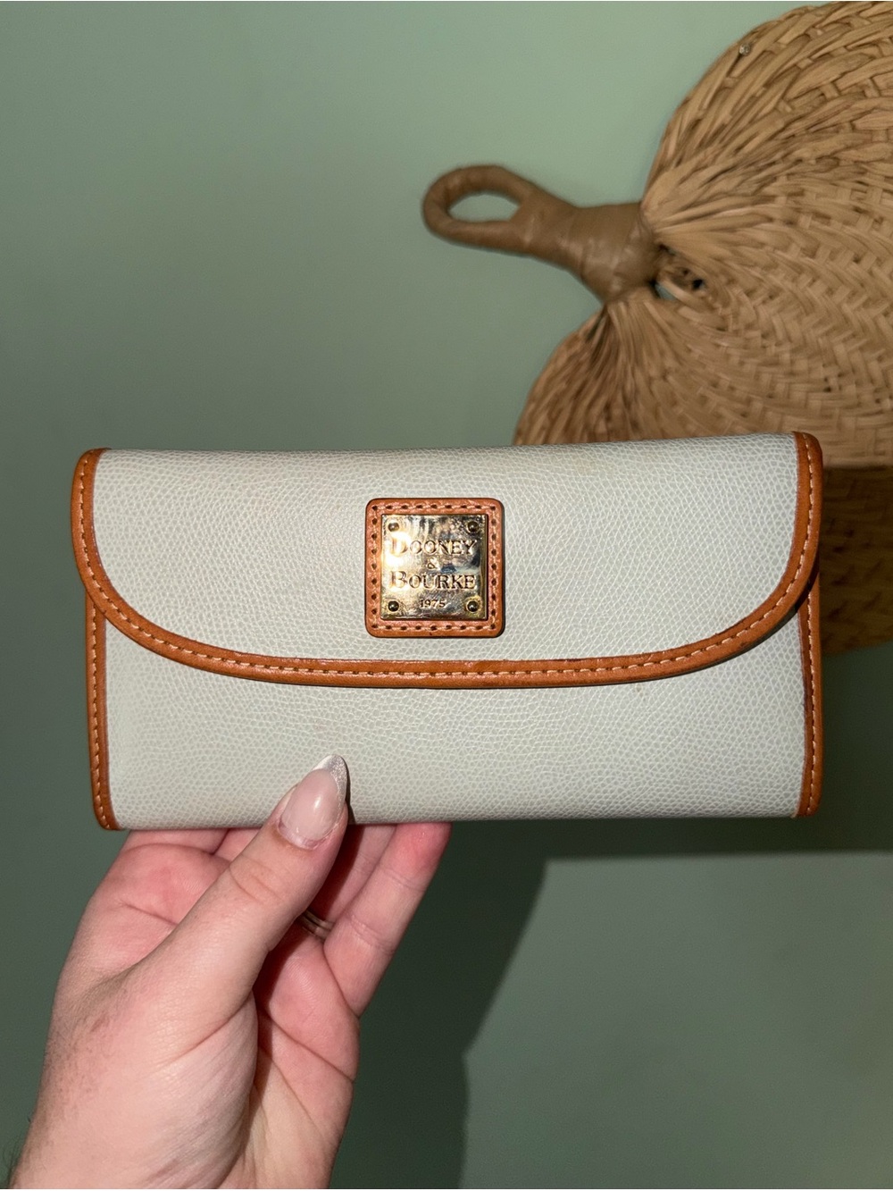 Dooney & Bourke Cream Wallet with Tan Trim and Logo Plaque